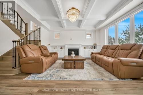 136 Harpin Way E, Centre Wellington, ON - Indoor Photo Showing Living Room With Fireplace