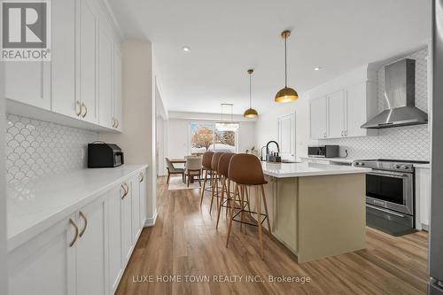 136 Harpin Way E, Centre Wellington, ON - Indoor Photo Showing Kitchen With Upgraded Kitchen