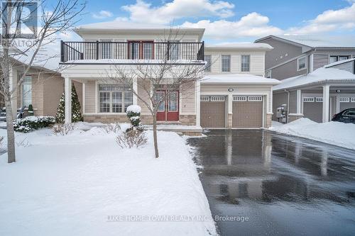 136 Harpin Way E, Centre Wellington, ON - Outdoor With Balcony With Facade