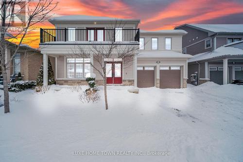 136 Harpin Way E, Centre Wellington, ON - Outdoor With Balcony With Facade