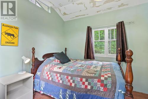 Inside of Bunkie - Unit #8 - 1111 Buckeye Road, Muskoka Lakes (Medora), ON - Indoor Photo Showing Bedroom