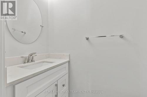 2 Piece bath in living room - 60 West Street N, Thorold (Thorold Downtown), ON - Indoor Photo Showing Bathroom
