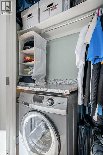 Insuite washer/dryer - 101, 312 15 Avenue Ne, Calgary, AB - Indoor Photo Showing Laundry Room