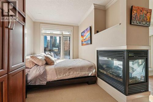 Bedroom - 306, 660 Eau Claire Avenue Sw, Calgary, AB - Indoor Photo Showing Bedroom
