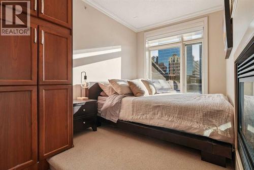 Bedroom and large pantry storage - 306, 660 Eau Claire Avenue Sw, Calgary, AB - Indoor Photo Showing Bedroom