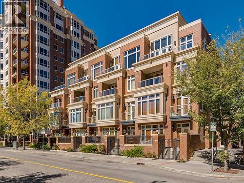 Heart of Eau Claire location - 306, 660 Eau Claire Avenue Sw, Calgary, AB - Outdoor With Balcony With Facade