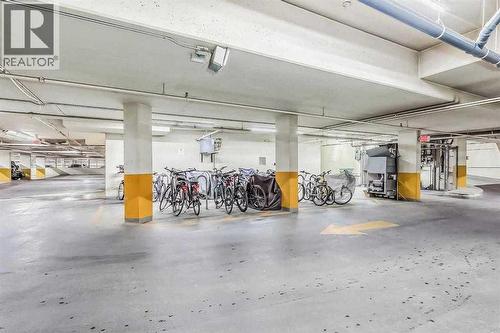 Underground bike storage - 306, 660 Eau Claire Avenue Sw, Calgary, AB - Indoor Photo Showing Garage