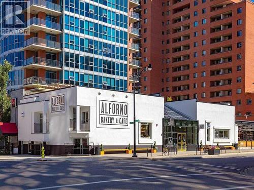 Outstanding cafes to walk to - 306, 660 Eau Claire Avenue Sw, Calgary, AB - Outdoor With Balcony With Facade