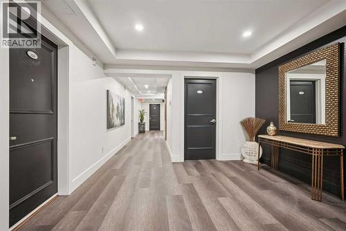 Recent upgraded common areas. Garbage Shoot on each floor - 306, 660 Eau Claire Avenue Sw, Calgary, AB - Indoor Photo Showing Other Room