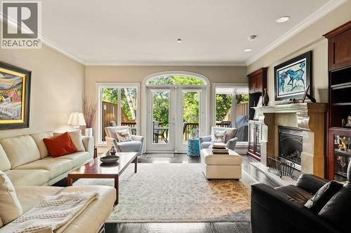 2421 Erlton Street Sw, Calgary, AB - Indoor Photo Showing Living Room With Fireplace