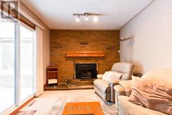 family room and sliding door to deck - 