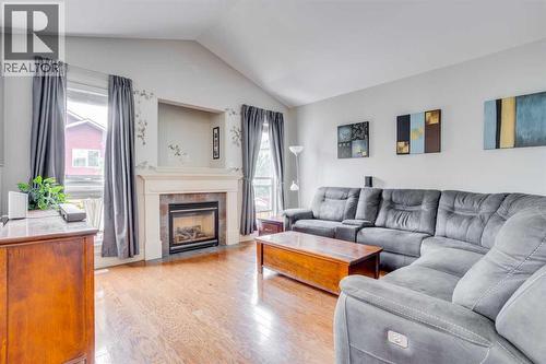 176 Maple Leaf Lane, Fort Mcmurray, AB - Indoor Photo Showing Living Room With Fireplace