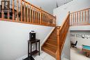 Oak Railing, bright entrance - 237 Trillium Road, Fort Mcmurray, AB  - Indoor Photo Showing Other Room 