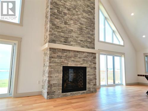 23 Main Road, Port Au Port, NL - Indoor Photo Showing Living Room With Fireplace