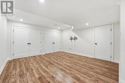 Recroom with wall of closet space - 