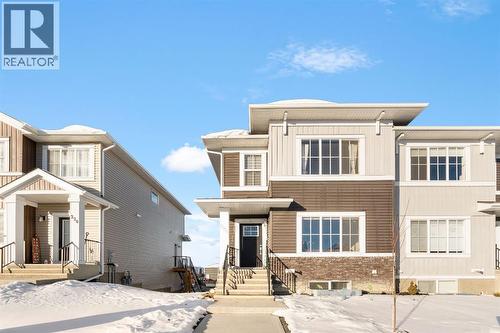 224 River Heights Drive, Cochrane, AB - Outdoor With Facade