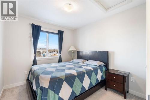 224 River Heights Drive, Cochrane, AB - Indoor Photo Showing Bedroom