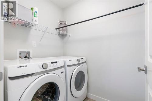 224 River Heights Drive, Cochrane, AB - Indoor Photo Showing Laundry Room