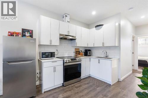 Basement - 224 River Heights Drive, Cochrane, AB - Indoor Photo Showing Kitchen