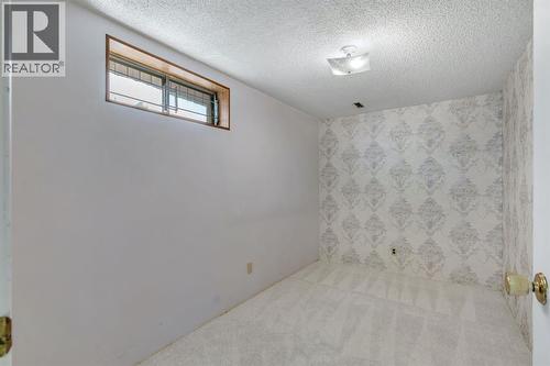 127 Falshire Way Ne, Calgary, AB - Indoor Photo Showing Other Room
