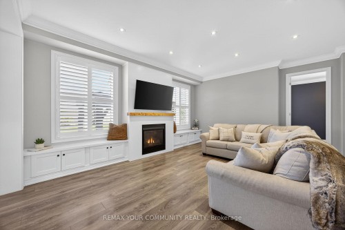 44 Cameron Street, Springwater, ON - Indoor Photo Showing Living Room With Fireplace