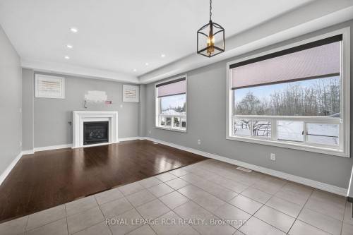 82 Lampkin Street, Georgina, ON - Indoor Photo Showing Living Room With Fireplace
