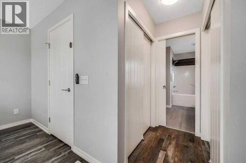 731, 101 Sunset Drive, Cochrane, AB - Indoor Photo Showing Other Room