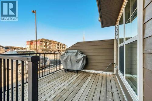 731, 101 Sunset Drive, Cochrane, AB - Outdoor With Deck Patio Veranda With Exterior