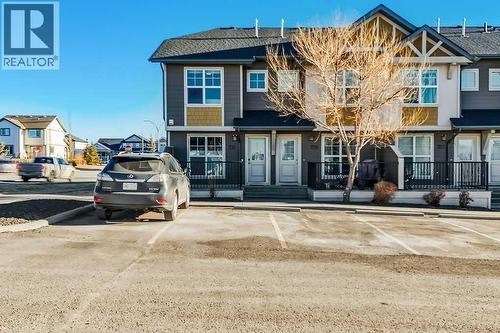 731, 101 Sunset Drive, Cochrane, AB - Outdoor With Facade