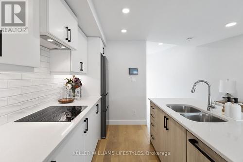 B117 - 2082 Lumen Drive, London South (South A), ON - Indoor Photo Showing Kitchen With Double Sink With Upgraded Kitchen