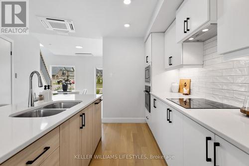 B117 - 2082 Lumen Drive, London South (South A), ON - Indoor Photo Showing Kitchen With Double Sink With Upgraded Kitchen