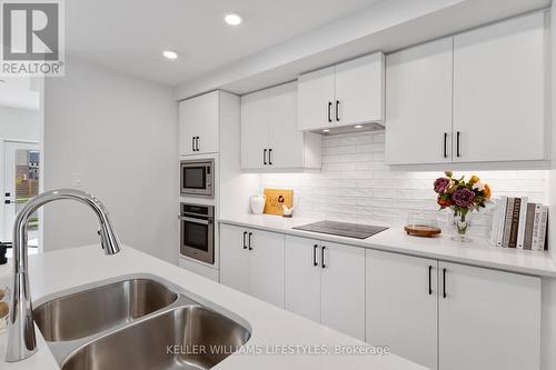 B117 - 2082 Lumen Drive, London South (South A), ON - Indoor Photo Showing Kitchen With Double Sink