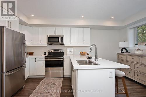 Unit 27 - 3202 Vivian Line, Stratford, ON - Indoor Photo Showing Kitchen With Double Sink