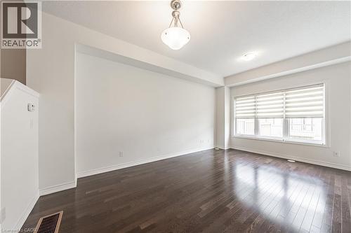 Spare room featuring dark wood finished floors - 391 Athabasca Common, Oakville, ON - Indoor Photo Showing Other Room