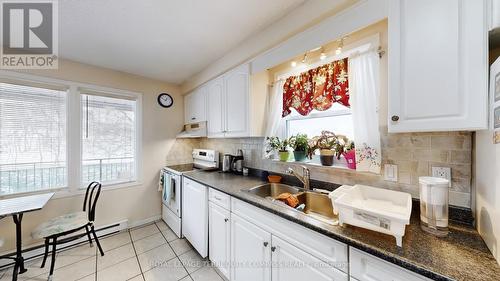8 - 530 Falgarwood Drive, Oakville, ON - Indoor Photo Showing Kitchen With Double Sink
