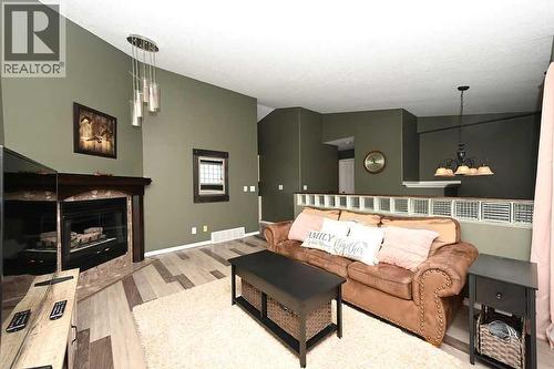 2814 45 Avenue, Athabasca, AB - Indoor Photo Showing Living Room With Fireplace