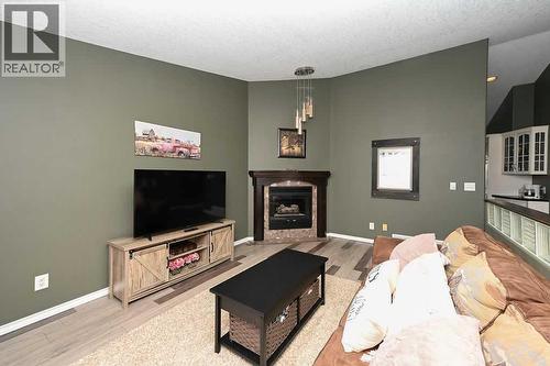 2814 45 Avenue, Athabasca, AB - Indoor Photo Showing Living Room With Fireplace