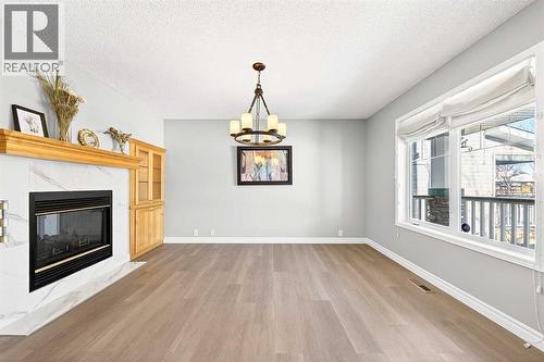 15209 Prestwick Boulevard Se, Calgary, AB - Indoor Photo Showing Other Room With Fireplace