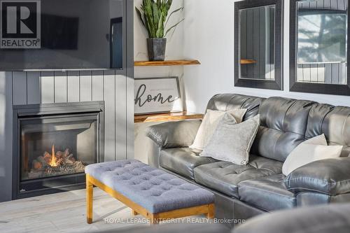 29 O4 Road, Rideau Lakes, ON - Indoor Photo Showing Living Room With Fireplace