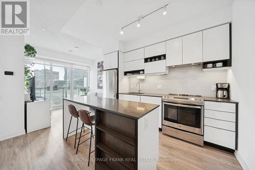 Kitchen with Island / Breakfast Bar - 407 - 4065 Confederation Parkway, Mississauga (City Centre), ON - Indoor Photo Showing Kitchen With Stainless Steel Kitchen With Upgraded Kitchen