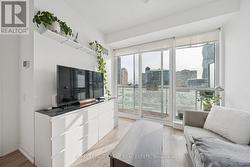 Living Room with Walk-Out to Balcony - 