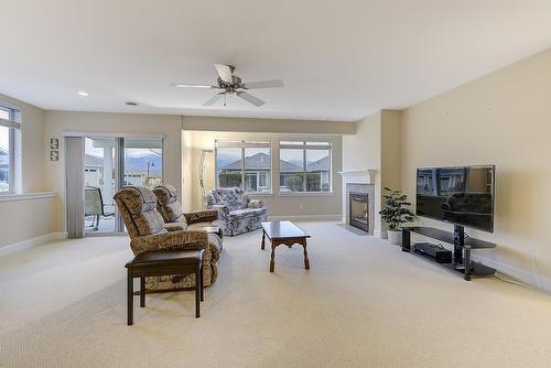 135-4035 Gellatly Road, West Kelowna, BC - Indoor Photo Showing Living Room With Fireplace