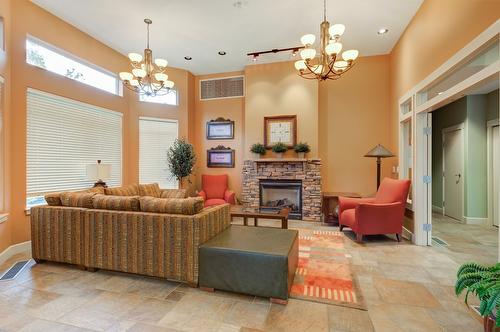 135-4035 Gellatly Road, West Kelowna, BC - Indoor Photo Showing Living Room With Fireplace