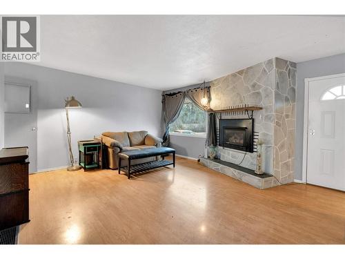 4010 Dodds Road, Armstrong, BC - Indoor Photo Showing Living Room With Fireplace