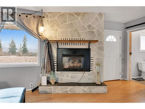 4010 Dodds Road, Armstrong, BC - Indoor Photo Showing Living Room With Fireplace