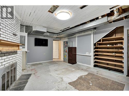 4010 Dodds Road, Armstrong, BC - Indoor Photo Showing Other Room With Fireplace
