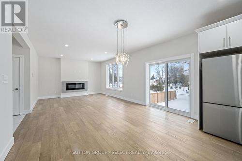 70 Royal Crescent, Southwold (Talbotville), ON - Indoor Photo Showing Other Room With Fireplace