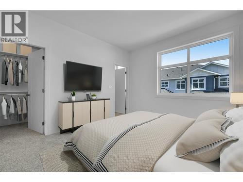 Photos are staged to show possibilities. Primary in another home also comes with luxury vinyl plank flooring. - 5300 Main Street Unit# 121, Kelowna, BC - Indoor Photo Showing Bedroom