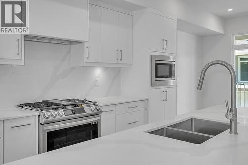 Photos may be of a similar home in the community - 5300 Main Street Unit# 121, Kelowna, BC - Indoor Photo Showing Kitchen With Double Sink With Upgraded Kitchen