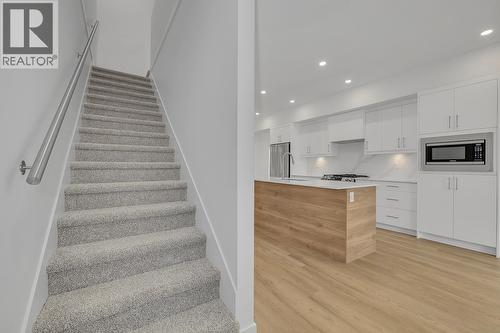 Photos may be of a similar home in the community - 5300 Main Street Unit# 121, Kelowna, BC - Indoor Photo Showing Kitchen